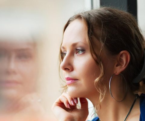 Truama Therapy Wichita Ks Woman Alone Looking Out Window